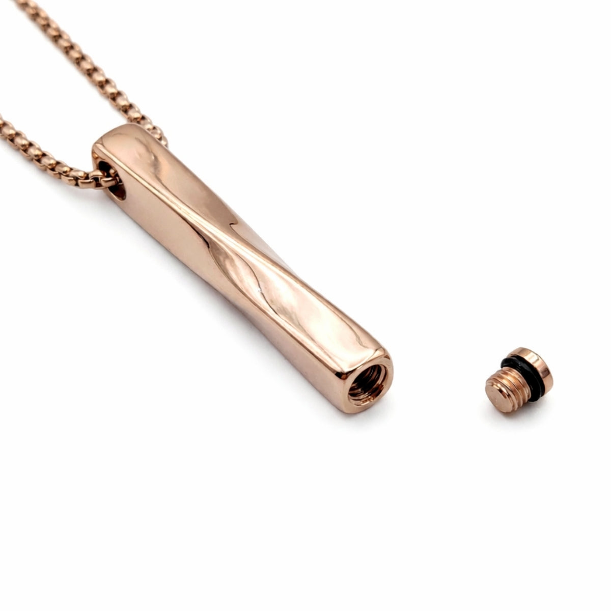 Détail du compartiment interne sécurisé de la Barre Torsadée Mémoire urne rose avec fermeture à vis