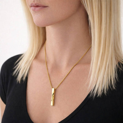 Barre Torsadée Mémoire urne doré au cou, bijou discret symbole de continuité et de souvenir intime