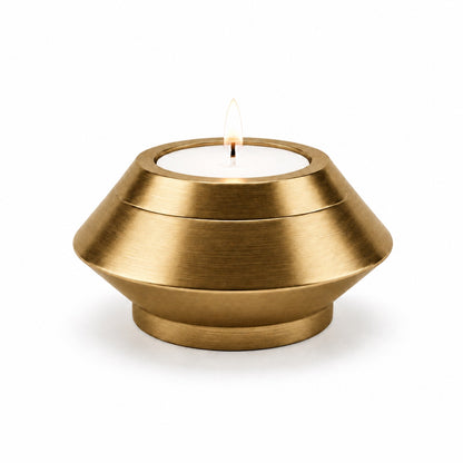 Bougie souvenir doré en acier inoxydable avec design moderne et minimaliste Mementery