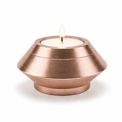 Bougie souvenir rose en acier inoxydable avec design moderne et minimaliste Mementery