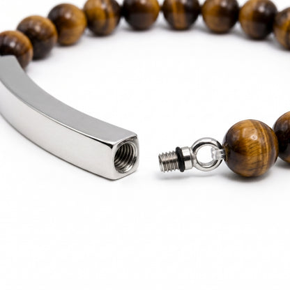 Détail de la barre en acier inoxydable du bracelet pierre du souvenir marron metal-gris avec système d’ouverture sécurisé