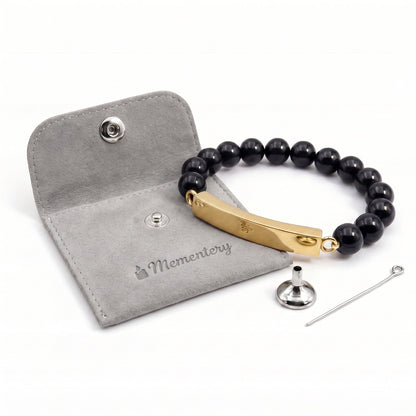 Coffret Mementery avec bracelet pierre du souvenir noir metal-jaune et accessoires inclus
