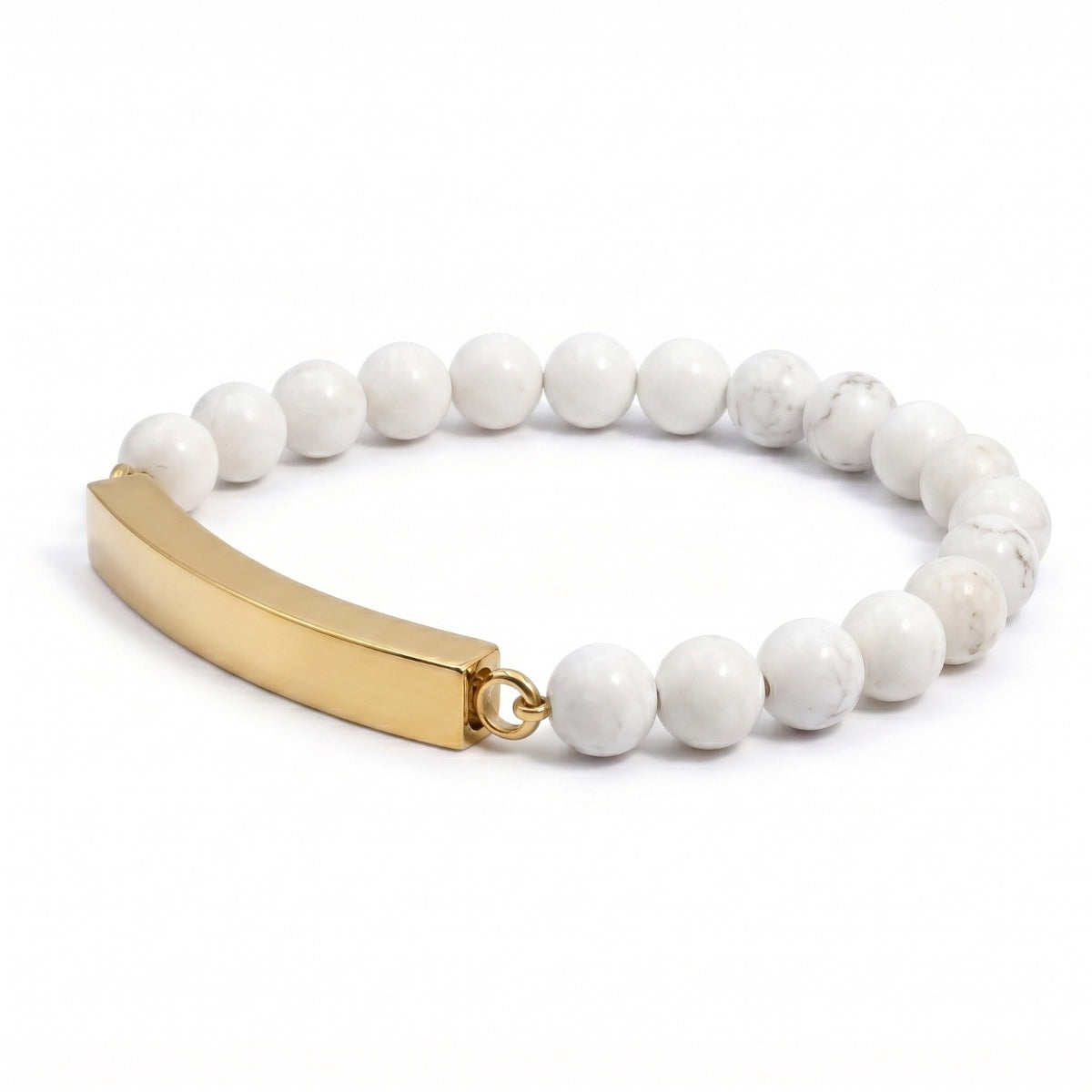 Vue 3/4 du bracelet pierre du souvenir blanc metal-jaune avec perles effet marbre blanc et barre