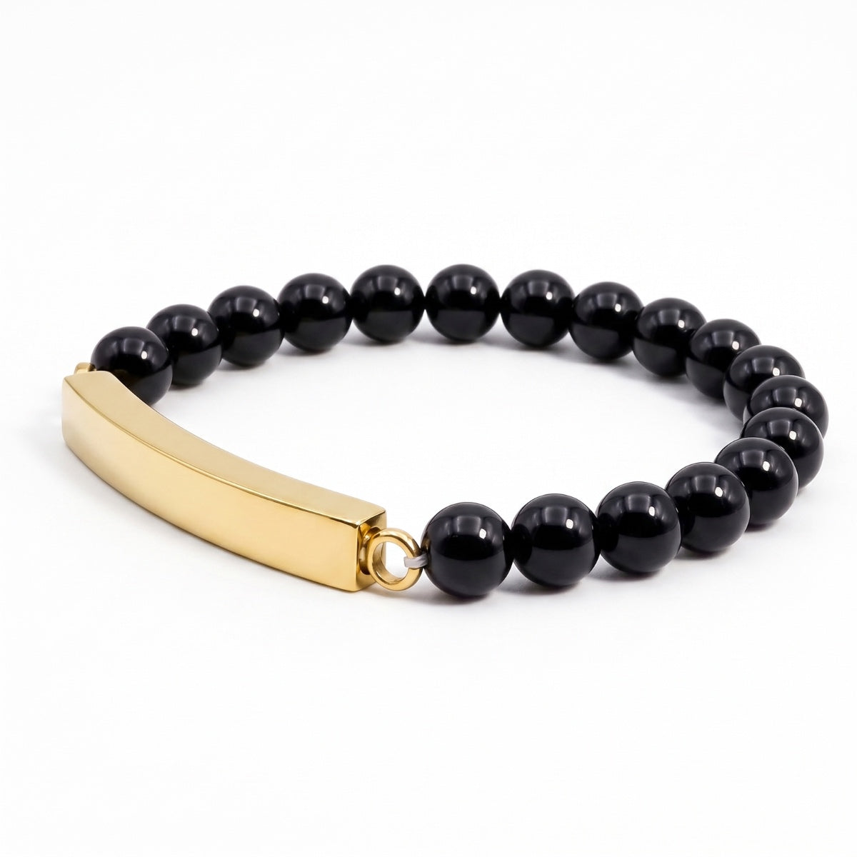 Vue 3/4 du bracelet pierre du souvenir noir metal-jaune avec perles noires et barre 