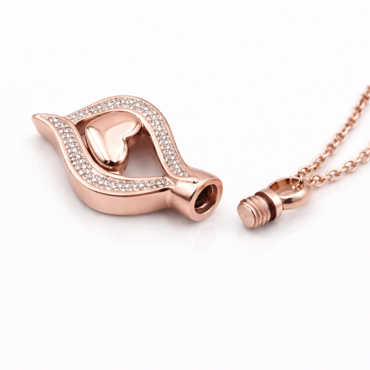 Détail du compartiment interne sécurisé du Cœur Protégé du Souvenir urne rose avec fermeture à vis