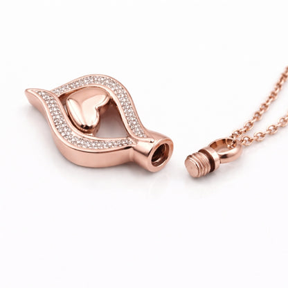 Détail du compartiment interne sécurisé du Cœur Protégé du Souvenir urne rose avec fermeture à vis