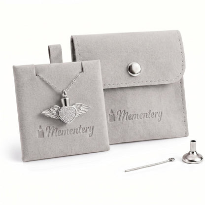 Coffret Mementery avec collier cœur ailé argenté, pochon velours et kit de remplissage inclus