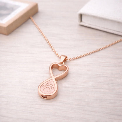 Collier empreinte éternelle en acier inoxydable rose dans une ambiance élégante et minimaliste