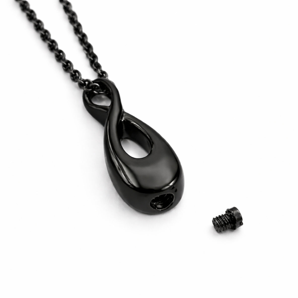 Détail du compartiment interne sécurisé du collier Lien Éternel urne noir avec fermeture à vis