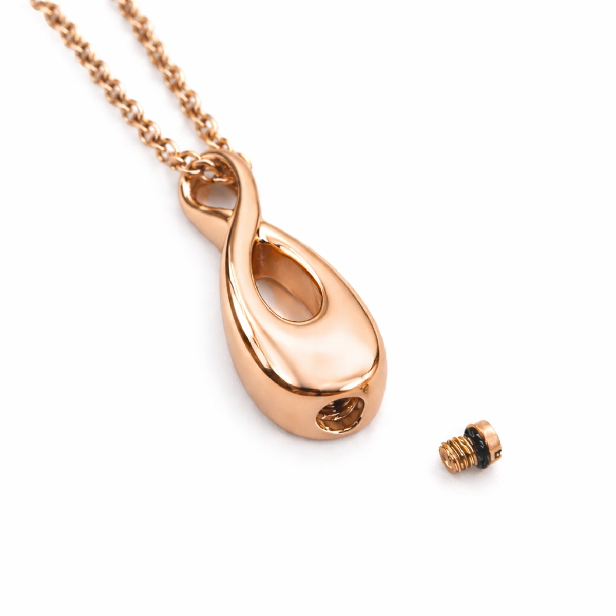Détail du compartiment interne sécurisé du collier Lien Éternel urne rose avec fermeture à vis