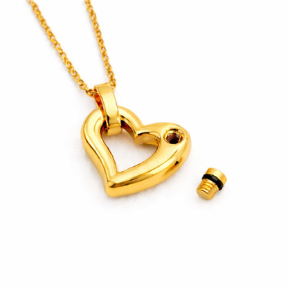 Détail du compartiment interne sécurisé du pendentif cœur éternel urne doré avec fermeture à vis