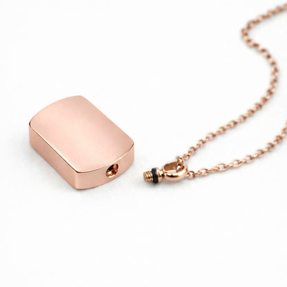 Détail du compartiment interne sécurisé du pendentif Héritage urne rose avec fermeture à vis