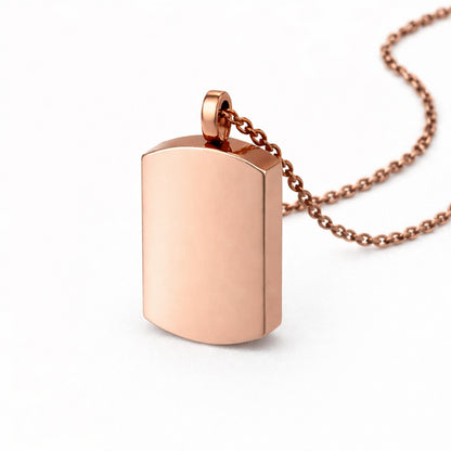 Vue 3/4 du pendentif Héritage urne rose avec finition lumineuse et design épuré