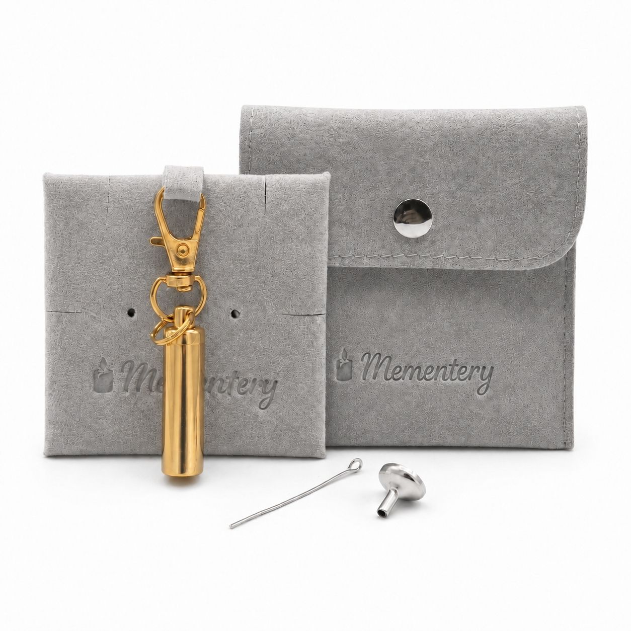 Porte-clés Capsule du Souvenir doré avec pochette Mementery et accessoires de remplissage inclus