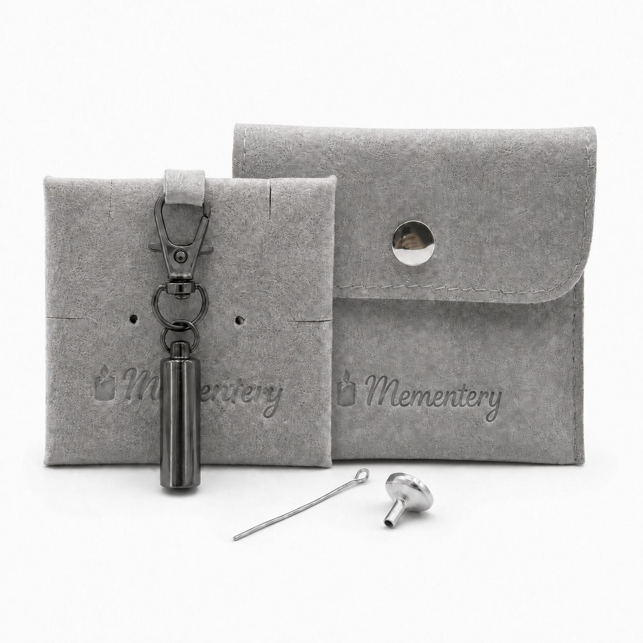 Porte-clés Capsule du Souvenir noir avec pochette Mementery et accessoires de remplissage inclus