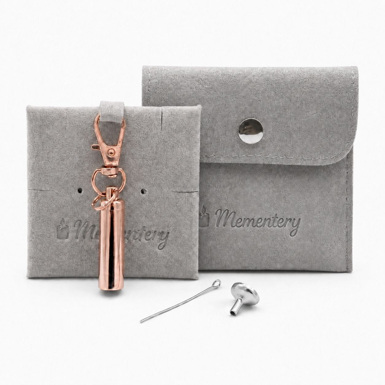 Porte-clés Capsule du Souvenir rose avec pochette Mementery et accessoires de remplissage inclus