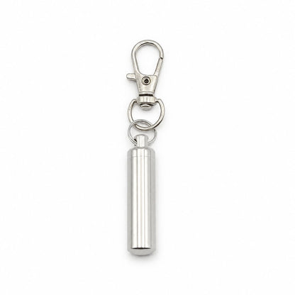 Porte-clés Capsule du Souvenir urne en acier inoxydable argenté avec compartiment sécurisé intégré – Mementery