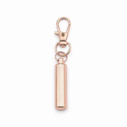 Porte-clés Capsule du Souvenir urne en acier inoxydable rose avec compartiment sécurisé intégré – Mementery