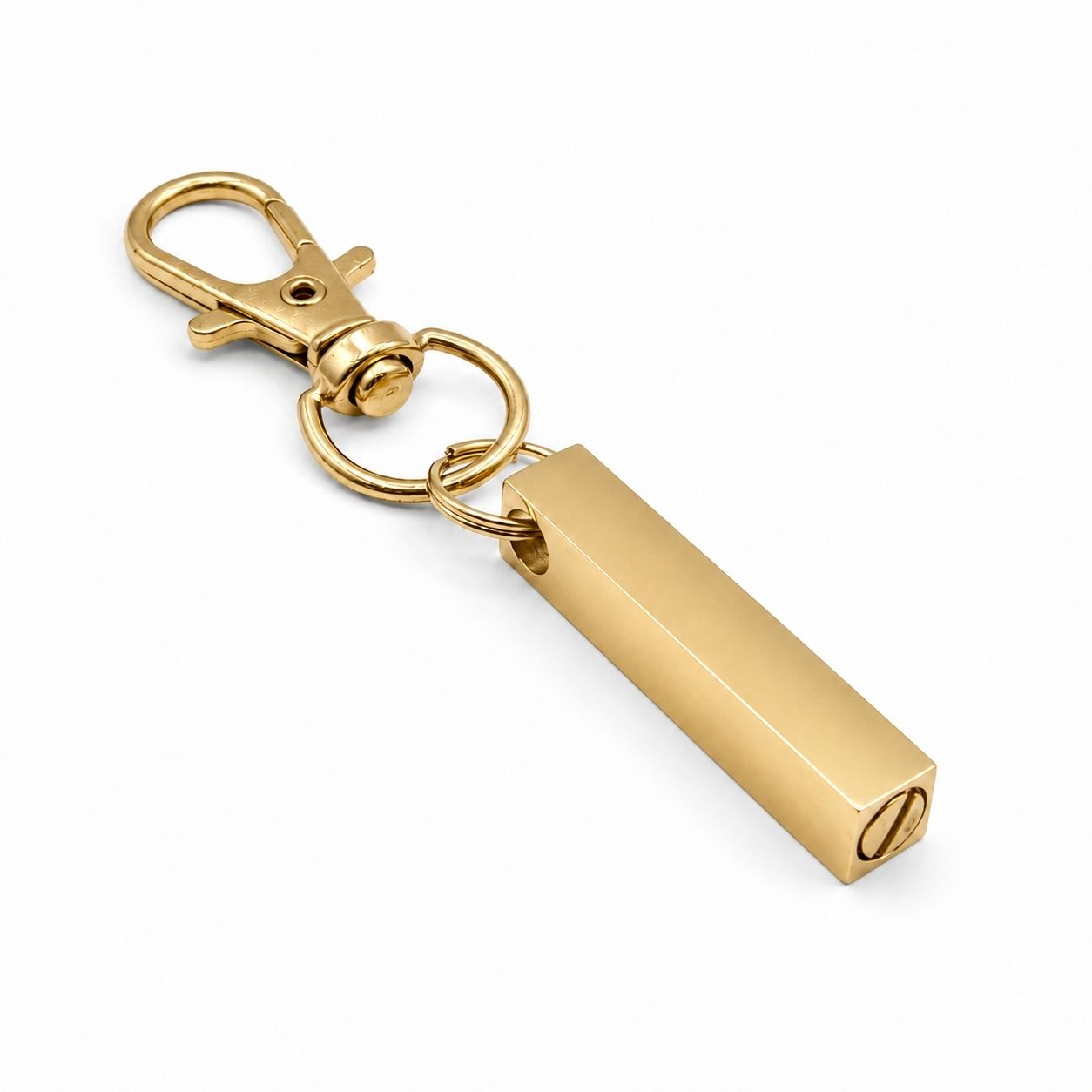 Vue 3/4 du porte-clés Écrin du Souvenir urne en acier inoxydable doré avec mousqueton et compartiment souvenir