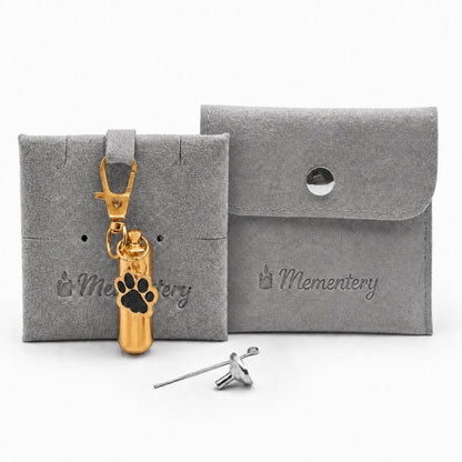 Porte-clés Empreinte du Souvenir doré avec pochette Mementery et accessoires de remplissage inclus