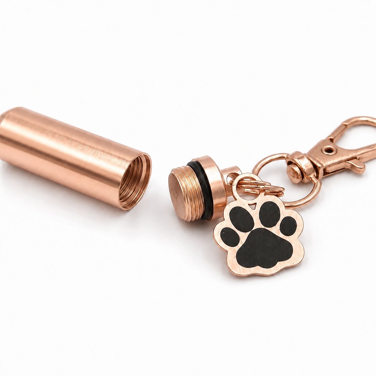 Détail du compartiment sécurisé du porte-clés Empreinte du Souvenir en acier inoxydable rose